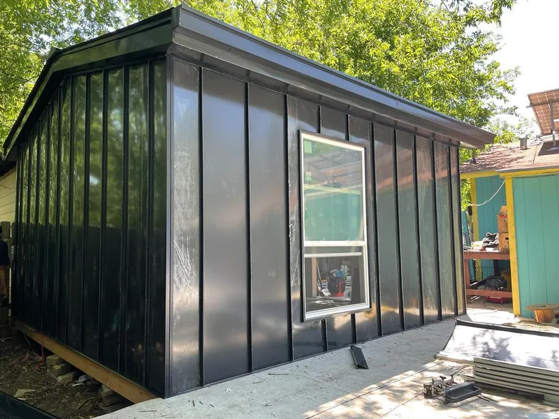 Black standing seam metal wall panels for Metal Roof Installation in Rifle